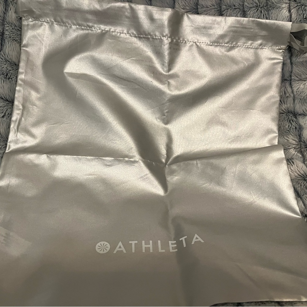 Athleta draw string bag.  Never used.  Made is recycled material.